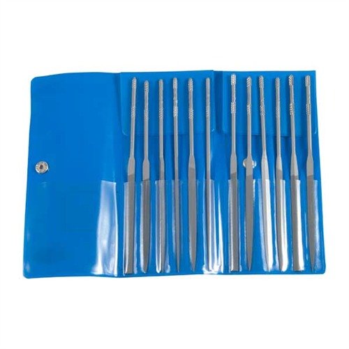 Il set di lime a ago FRIEDR. DICK GMBH offre 12 forme diverse, manici antiscivolo e una custodia resistente, ideale per lavori di precisione nel metallo.